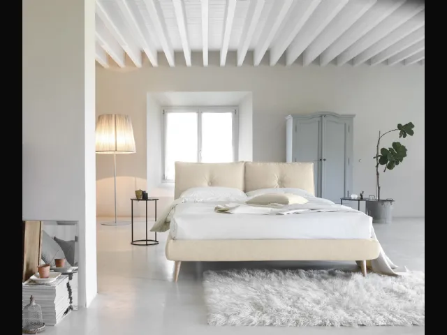 Upholstered double bed with So Lively headboard by Noctis.