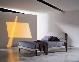 Read in Gervasoni's Strap fabric bed.