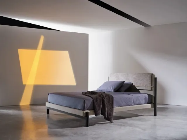 Read in Gervasoni's Strap fabric bed.
