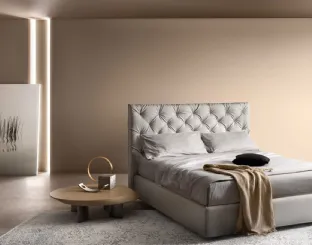 Padded bed with padded headboard 