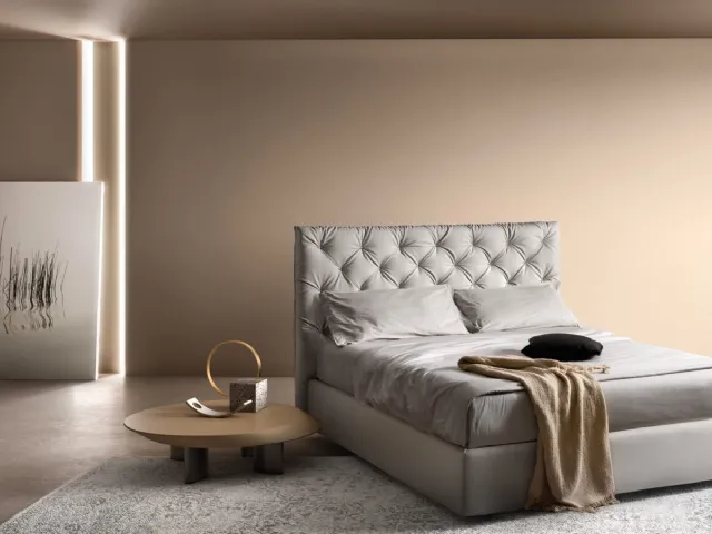 Padded bed with padded headboard 