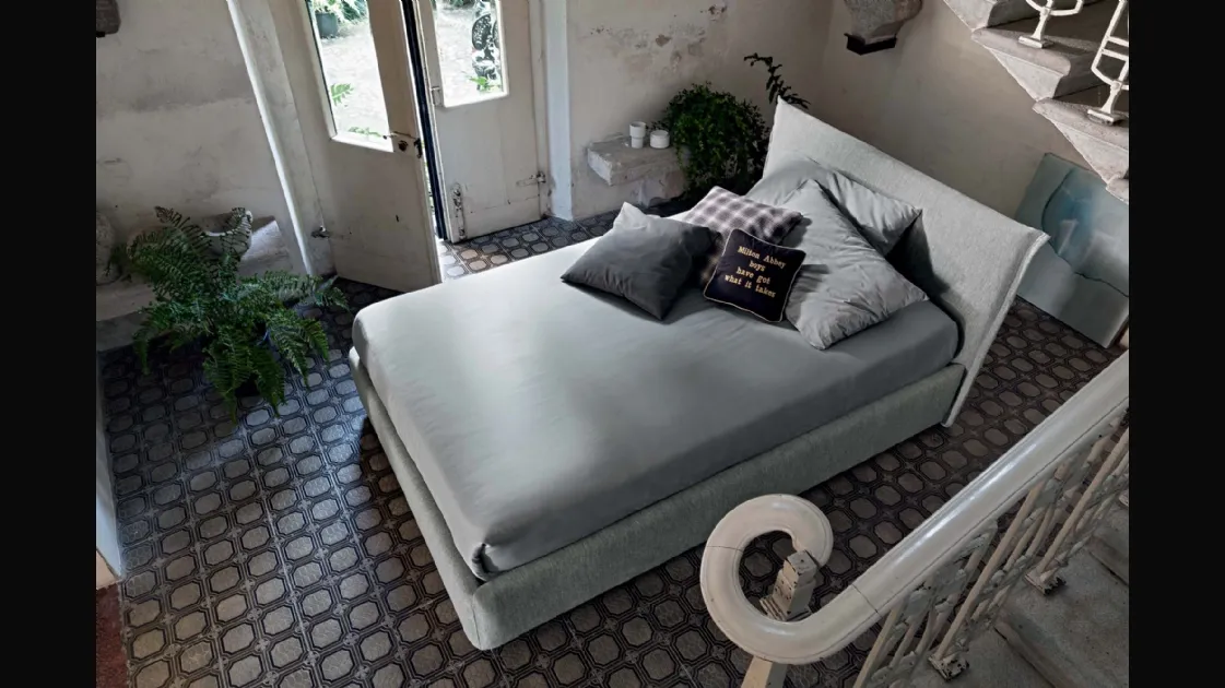 Upholstered fabric bed with Twin Line headboard by Veneran.