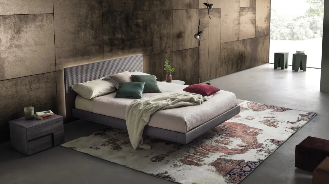 Zen bed with a suspended-effect headboard by Devina Nais