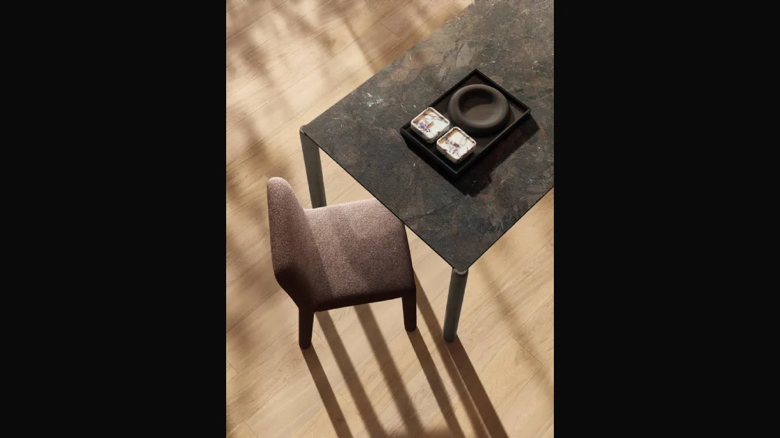 Chair upholstered in Aqualta 2795 fabric by Lago.