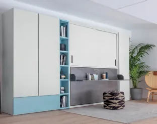Single pull-out bed closed with integrated desk in matte lacquered Hiro wardrobe by Clever.