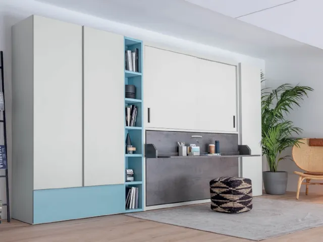 Single pull-out bed closed with integrated desk in matte lacquered Hiro wardrobe by Clever.