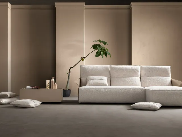 Relax fabric and leather sofa with Vibe Hit peninsula by Samoa