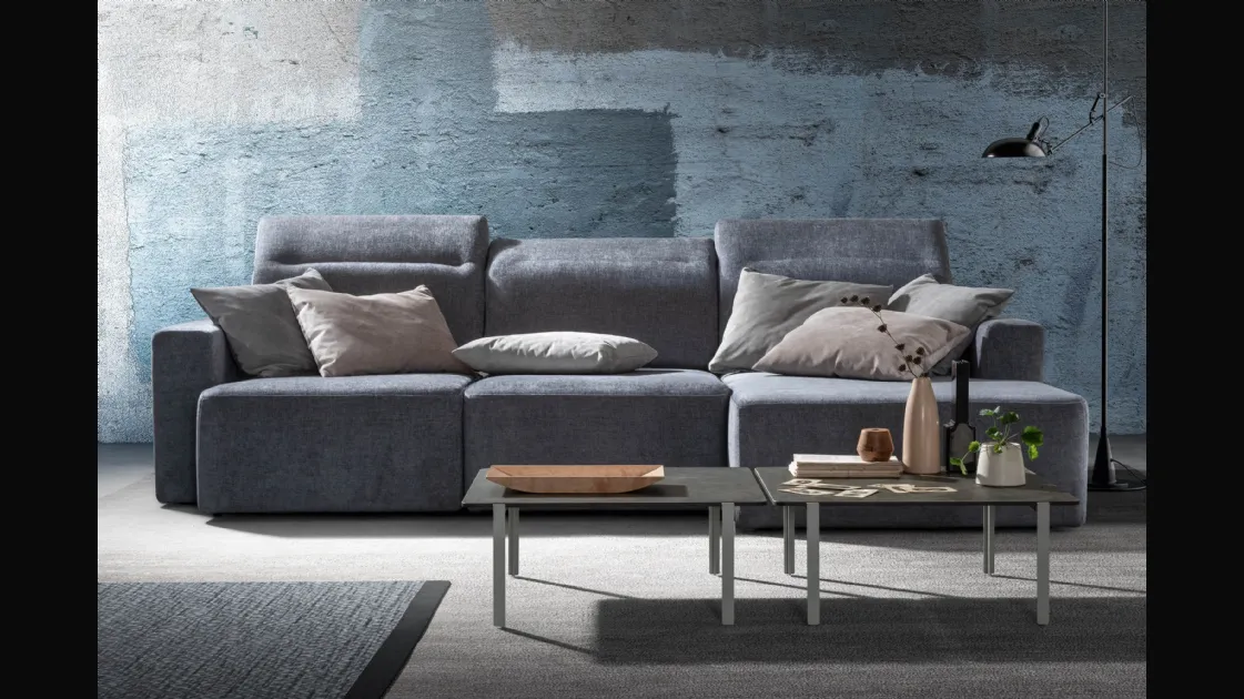 Linear fabric sofa with Glide retractable seats by Samoa.