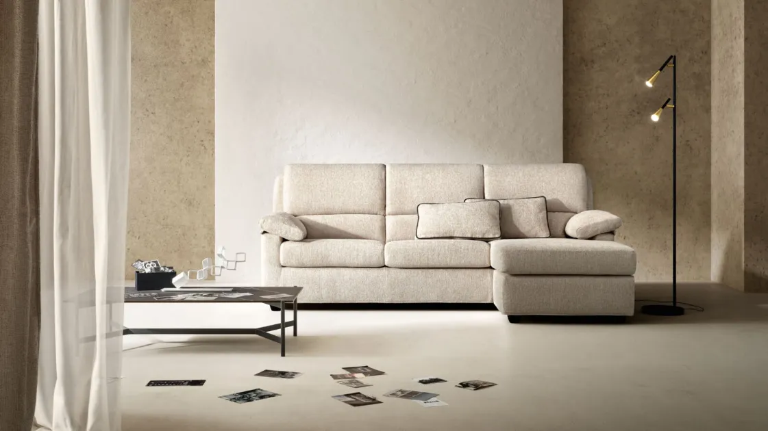 Retro-style sofa in fabric with Sun peninsula by Samoa.