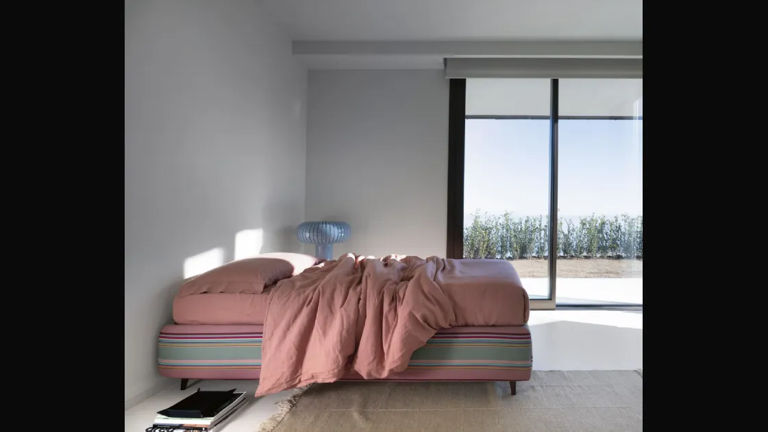 Single fabric Sommier bed by Noctis.