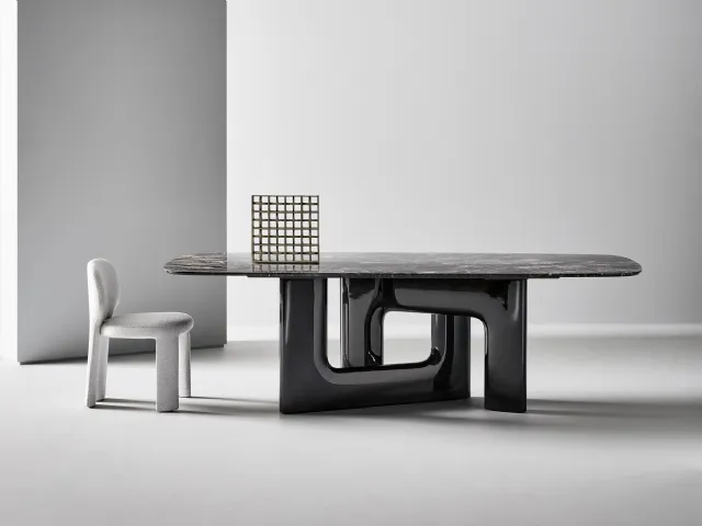 Liaison design table with marble top and polyurethane base by Bonaldo