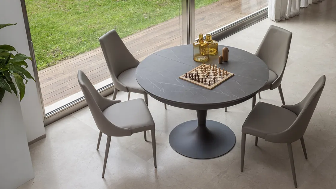 Extendable round table with Altacom Sun ceramic top.