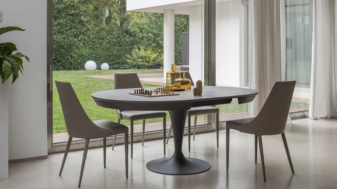 Extendable round table with ceramic top and metal base Sun by Altacom.