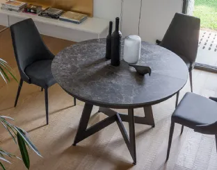 Extendable round table with ceramic top and metal structure Venus by Altacom.