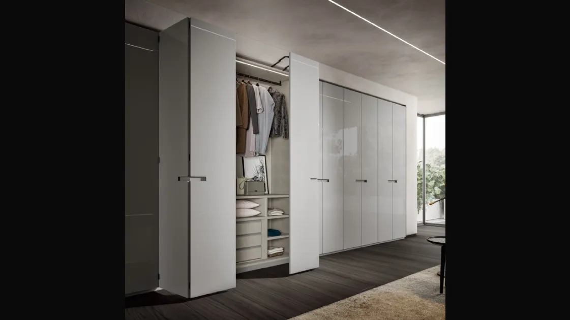 Wardrobe with Syncro folding doors in Veneran Ash lacquered finish.