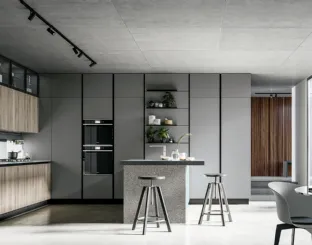 Modern kitchen with Round 04 peninsula in laminate and pet by Arredo3