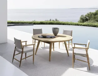 Round Eidos teak table by Gervasoni