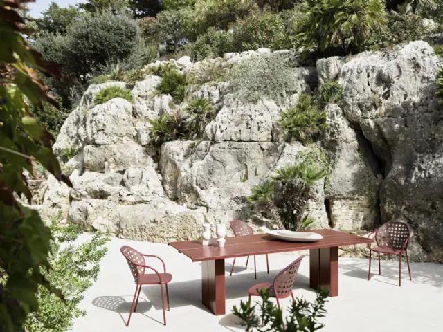 Eidos table in polystyrene with a concrete base by Gervasoni.